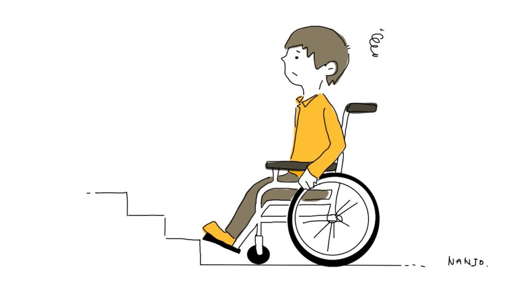 車椅子で階段を上れない様子